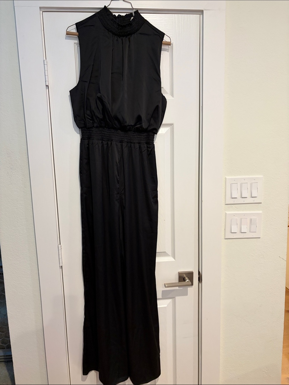 Classic Black Sleeveless Jumpsuit with Smocked Waist